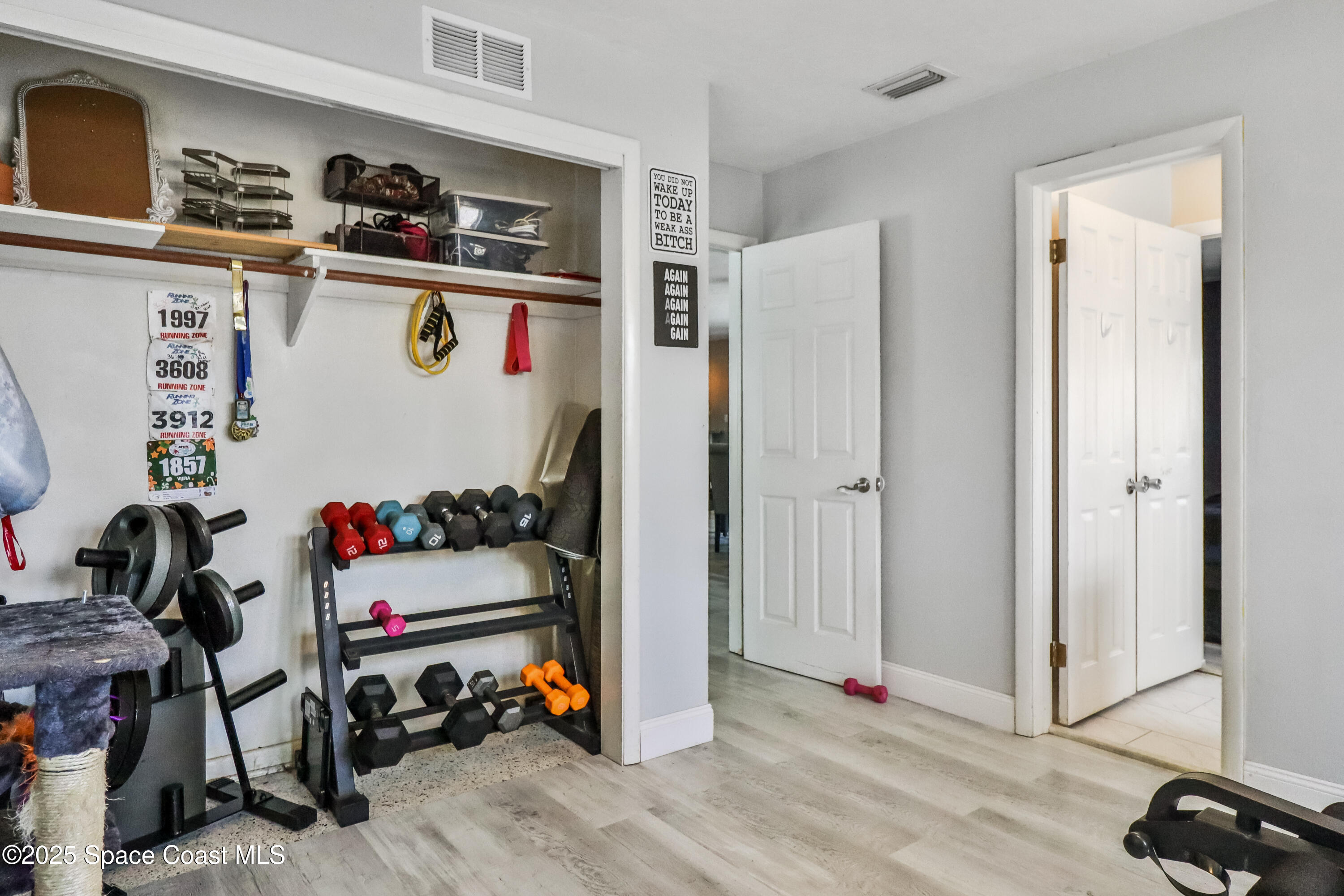 348 Berkeley Street Satellite Beach, FL 32937 - Photo 31 of 46 a view of a room with gym equipment
