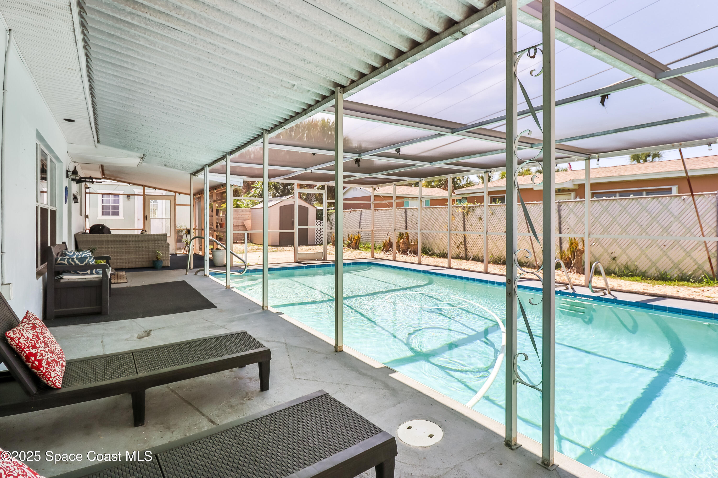 348 Berkeley Street Satellite Beach, FL 32937 - Photo 36 of 46 a view of swimming pool with seating area
