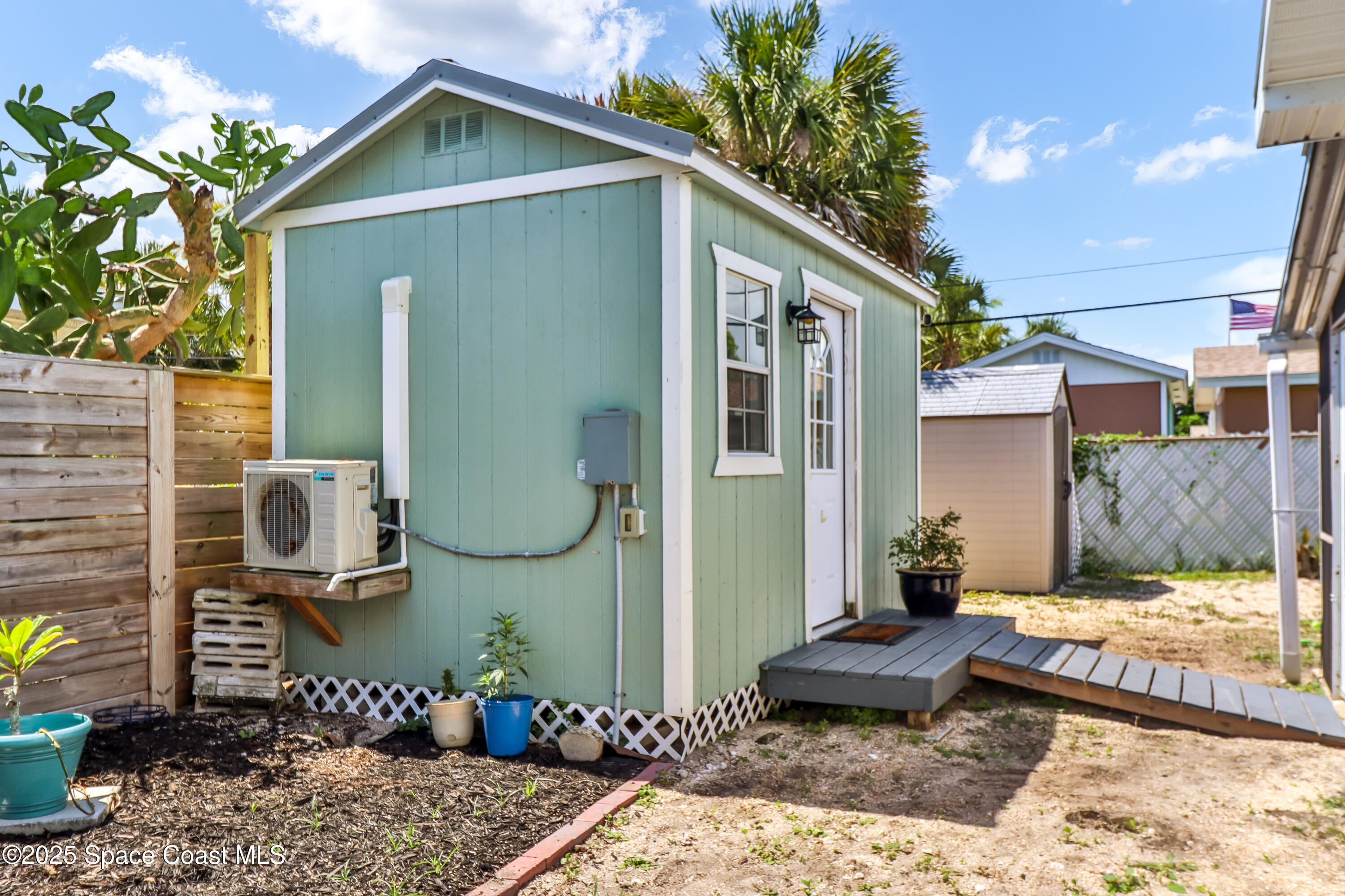 348 Berkeley Street Satellite Beach, FL 32937 - Photo 37 of 46 a front view of a house