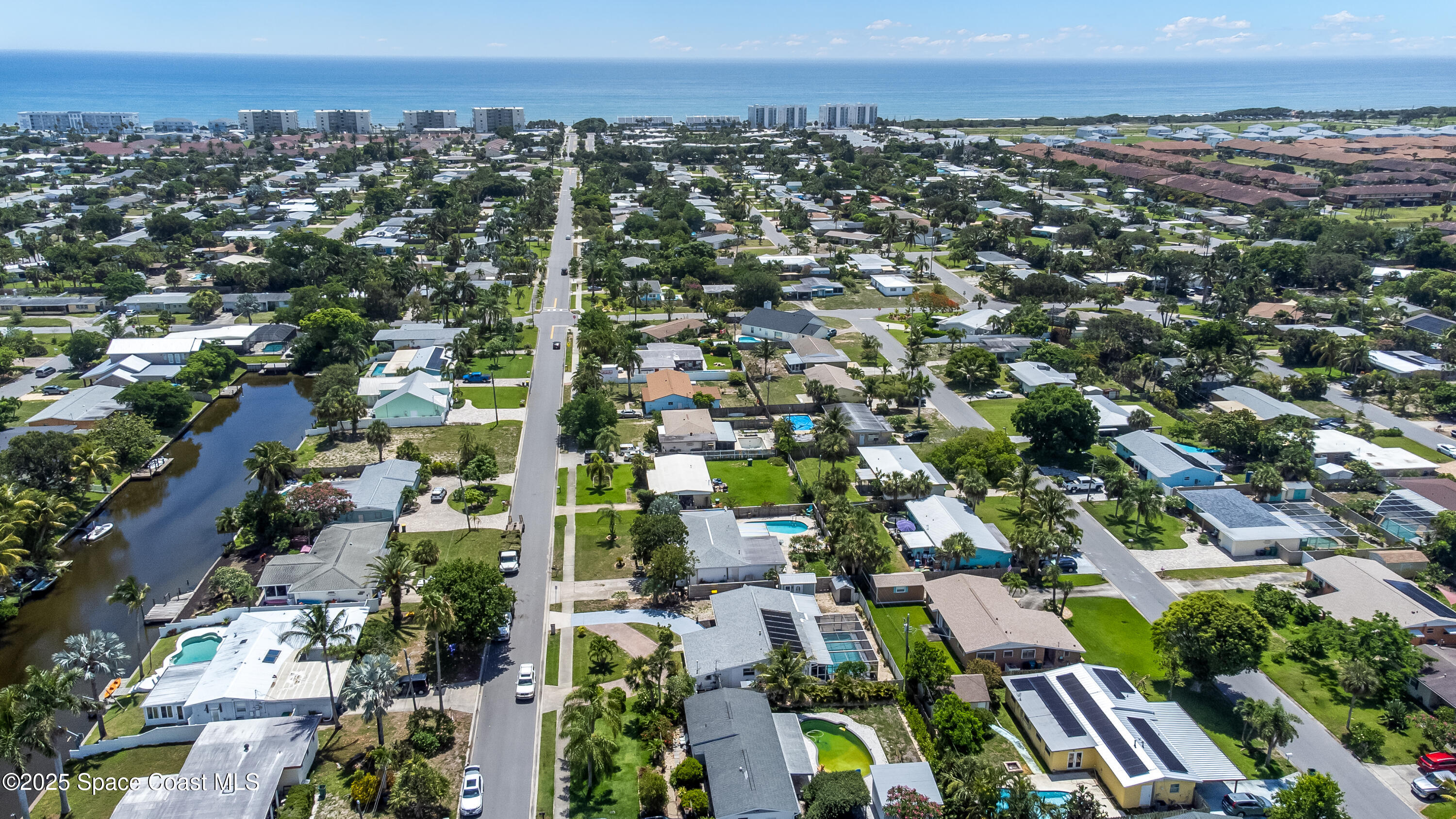 348 Berkeley Street Satellite Beach, FL 32937 - Photo 6 of 46 an aerial view of multiple house