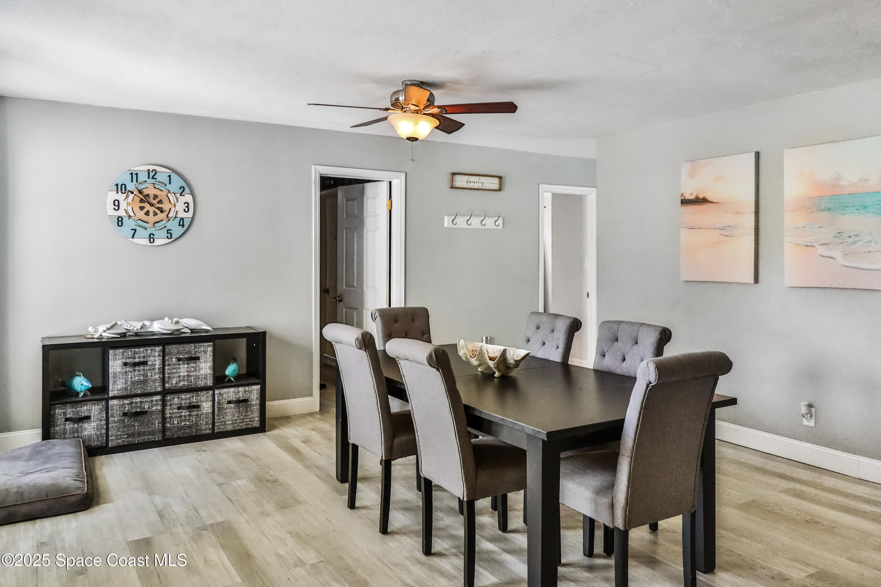 348 Berkeley Street Satellite Beach, FL 32937 - Photo 10 of 46 a view of a dining room with furniture