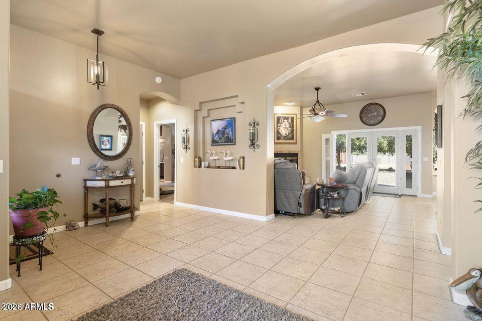37005 North 7th Street Phoenix, AZ 85086 - Photo 14 of 48 a living room with furniture a clock and a large window
