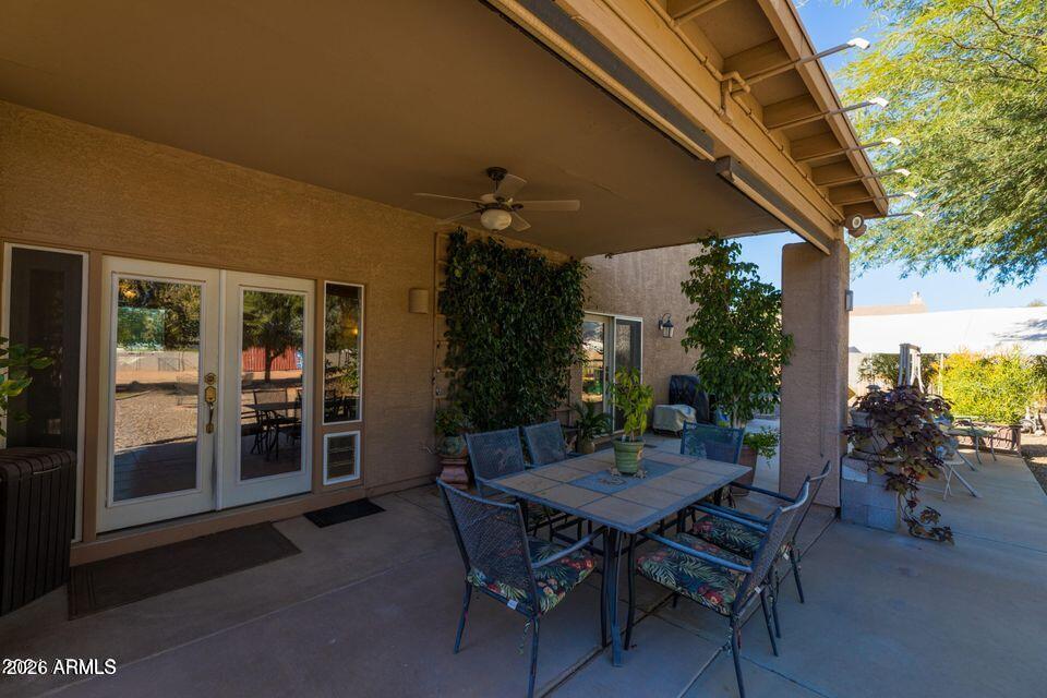37005 North 7th Street Phoenix, AZ 85086 - Photo 22 of 48 a view of a patio with table and chairs and potted plants