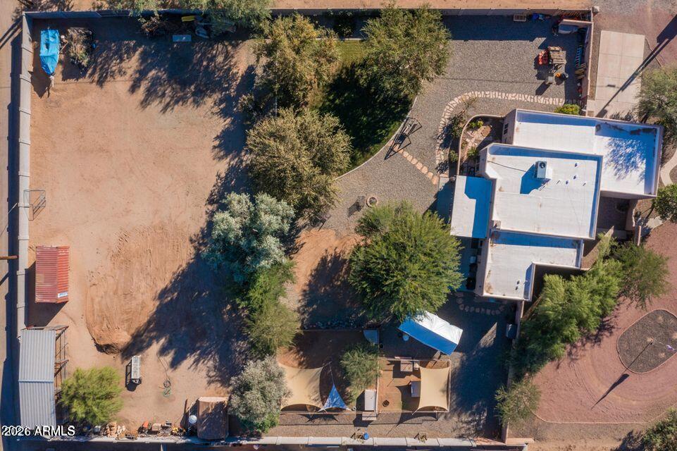 37005 North 7th Street Phoenix, AZ 85086 - Photo 45 of 48 an aerial view of a house with a yard and parking space