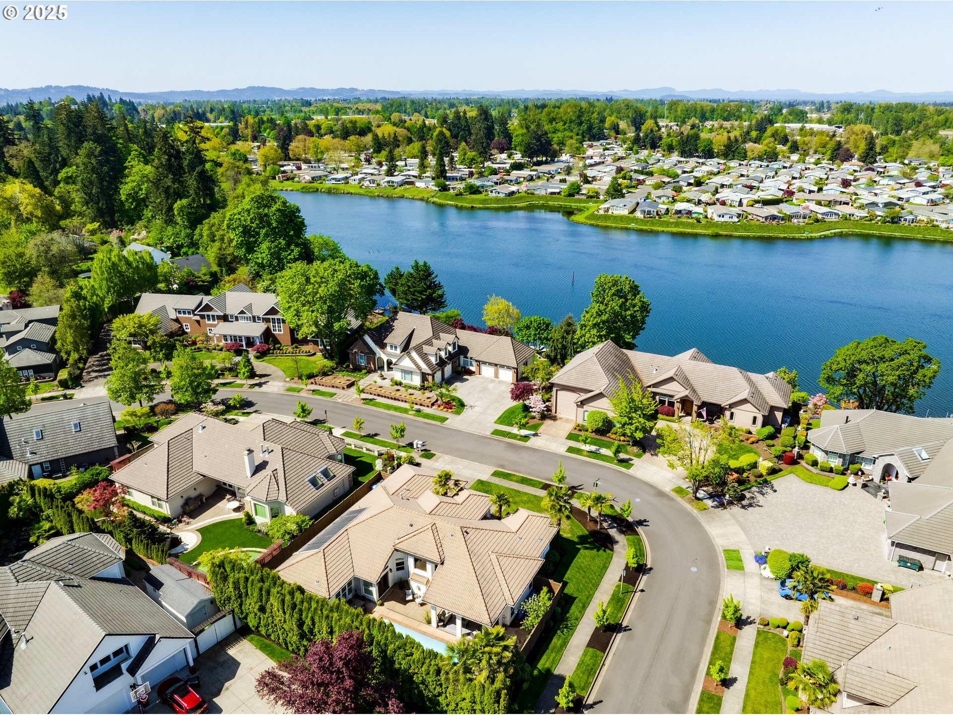 3193 Metolius Drive Eugene, OR 97408 - Photo 3 of 39 an aerial view of a house with a lake view