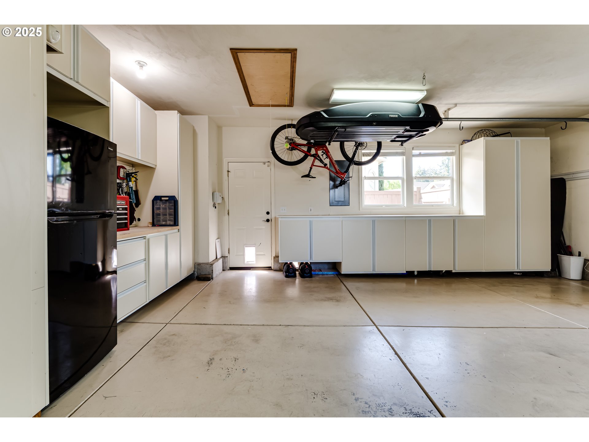 3193 Metolius Drive Eugene, OR 97408 - Photo 38 of 39 a view of living room with furniture and windows