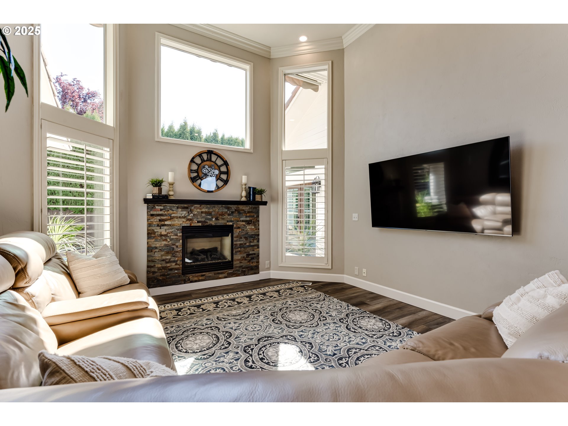 3193 Metolius Drive Eugene, OR 97408 - Photo 9 of 39 a living room with furniture and a fireplace