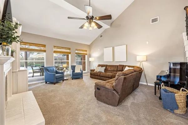 a bedroom with a bed and a desk