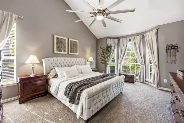 a building outdoor space with patio furniture and potted plants