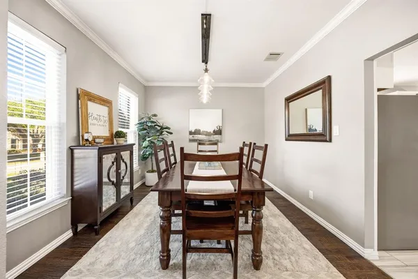 a living room with furniture fireplace and a flat screen tv