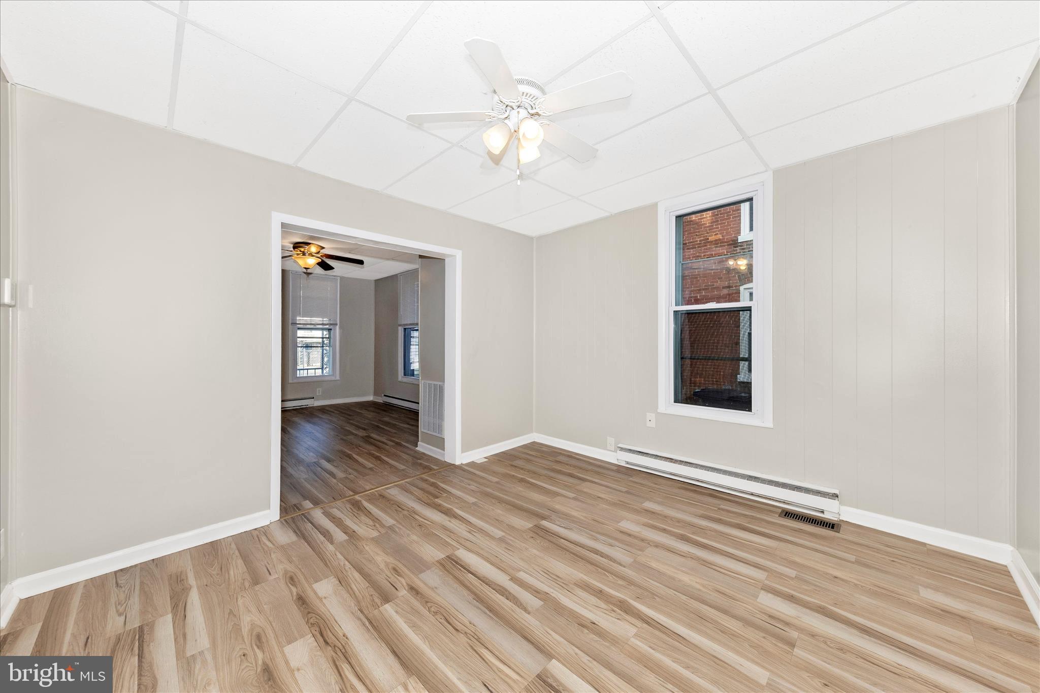 148 Hamilton Avenue Waynesboro, PA 17268 - Photo 12 of 50 wooden floor in an empty room with a window