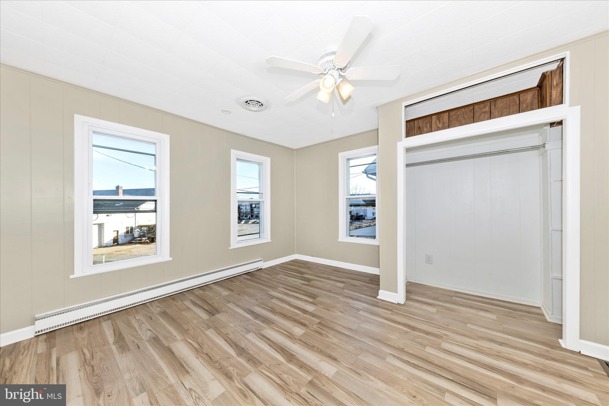 148 Hamilton Avenue Waynesboro, PA 17268 - Photo 23 of 50 wooden floor in an empty room with a window