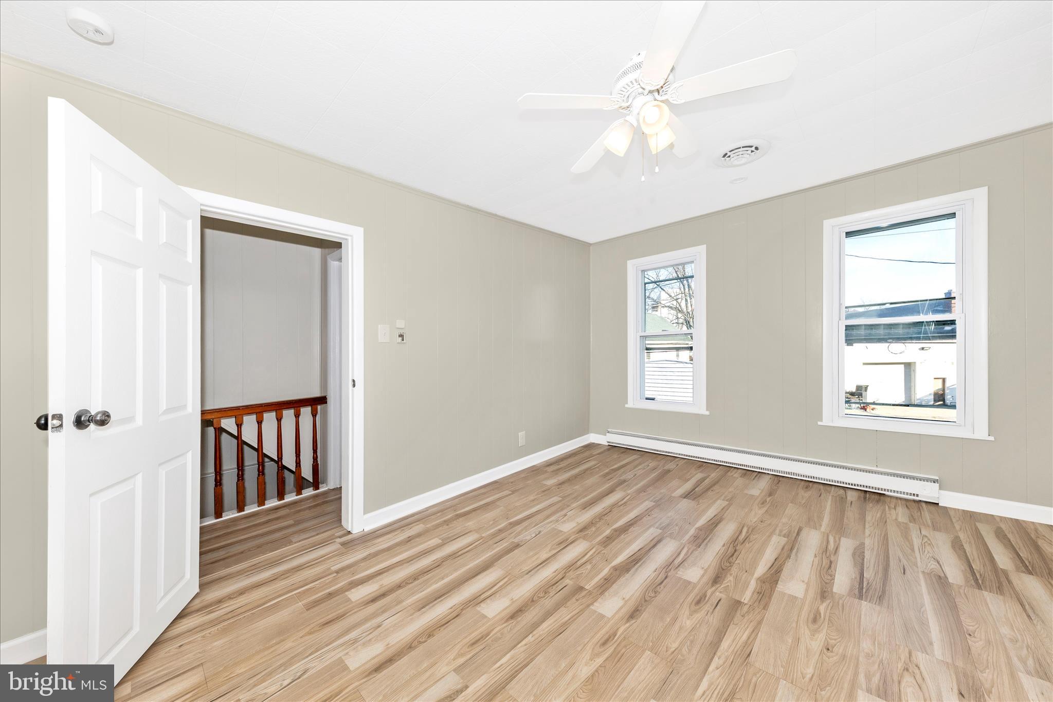 148 Hamilton Avenue Waynesboro, PA 17268 - Photo 25 of 50 a view of an empty room with wooden floor and a window
