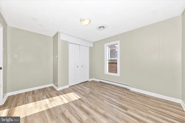 a view of a room with an empty space