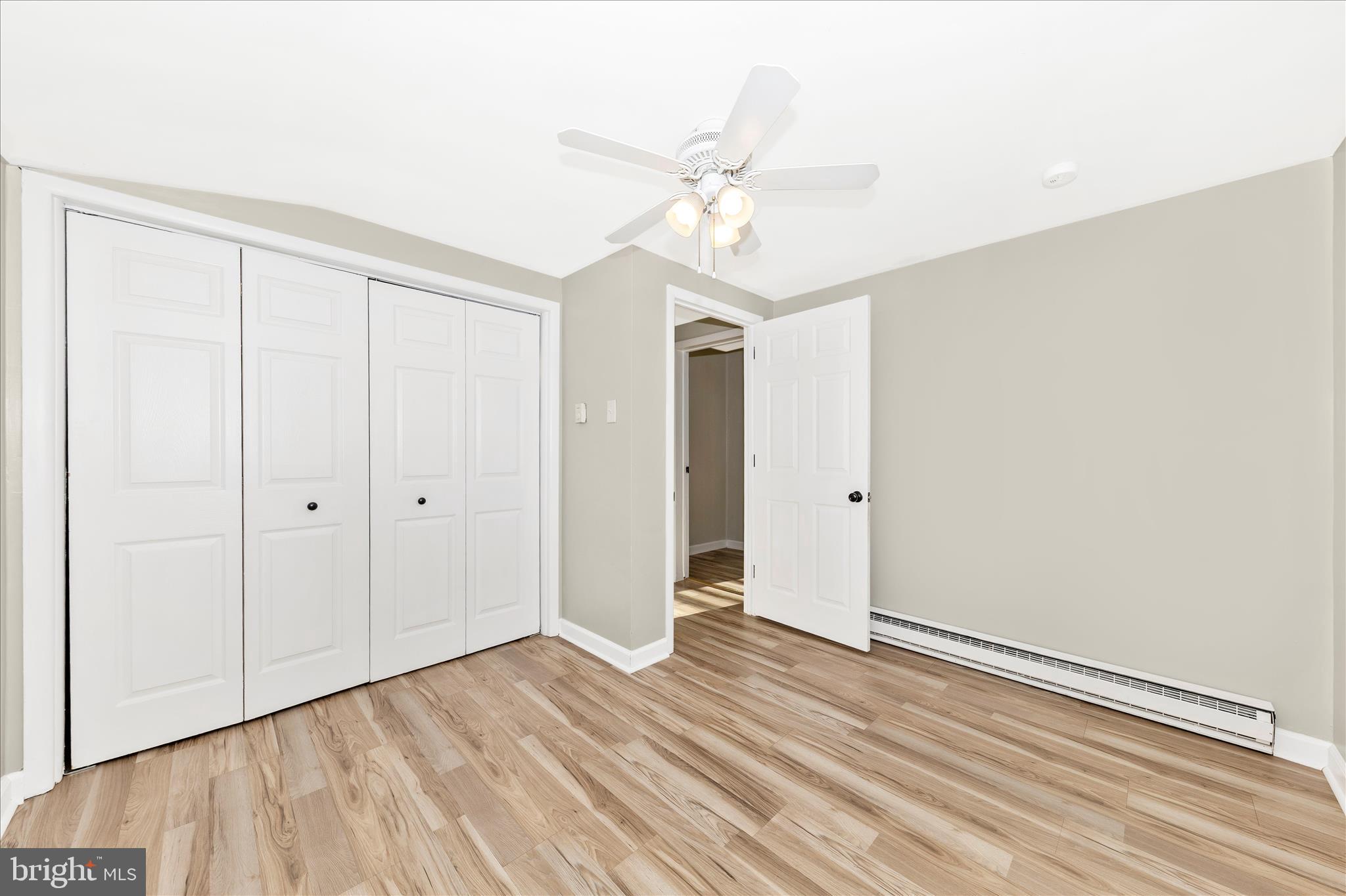148 Hamilton Avenue Waynesboro, PA 17268 - Photo 33 of 50 wooden floor in an empty room with a window