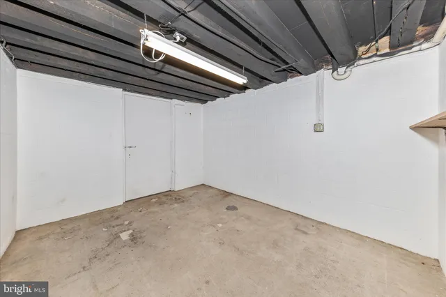 a view of a house with basketball court