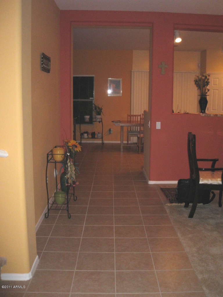 5413 West Apollo Road Laveen, AZ 85339 - Photo 3 of 16 Tiled Foyer and Hall Way