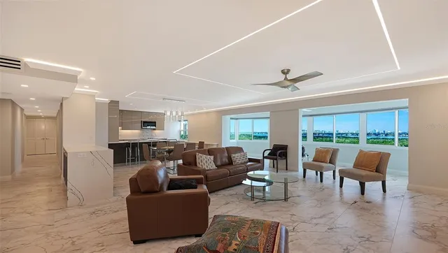 a bathroom with a sink toilet vanity and shower