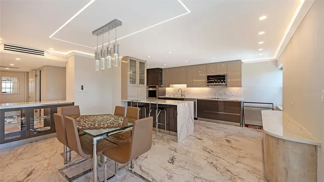 a bed room with furniture and a flat screen tv