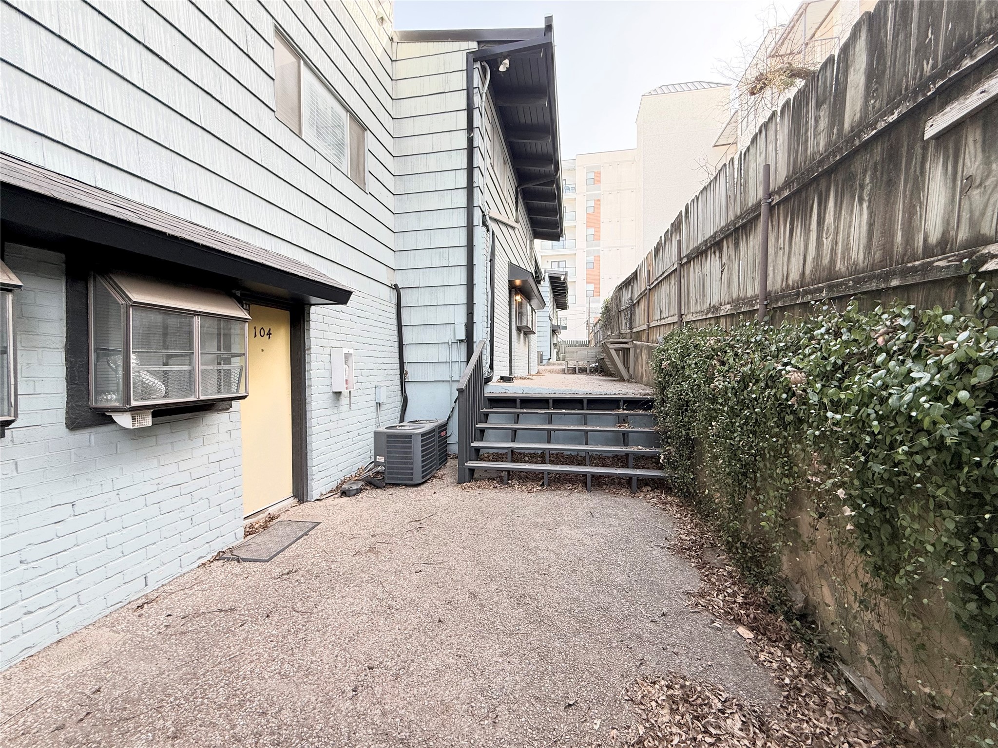 2413 Leon Street, Unit 108 Austin, TX 78705 - Photo 19 of 22 a view of a house with a yard