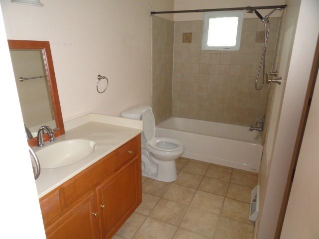 121 North Ridge Road Butler, PA 16001 - Photo 7 of 13 a bathroom with a sink a toilet and shower