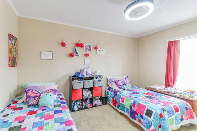 a bedroom with toys and a bed