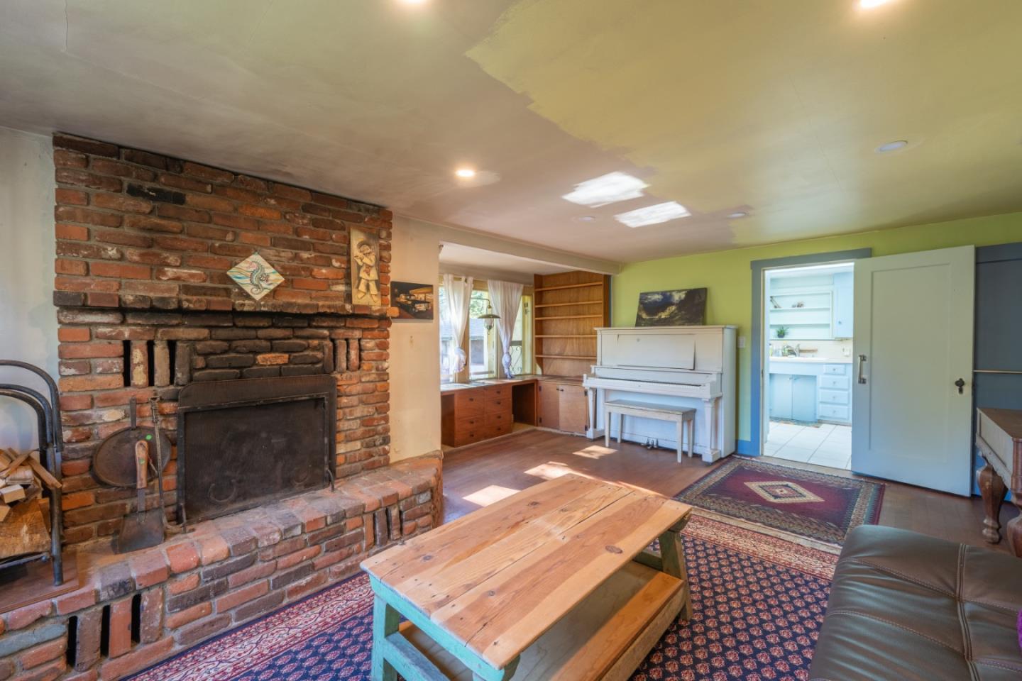 27415 Schulte Road Carmel, CA 93923 - Photo 3 of 30 a living room with furniture and a fireplace