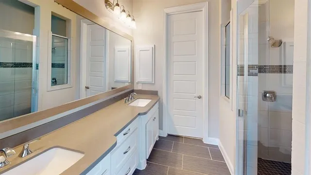 a bathroom with a tub and a sink