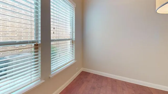 a view of a room that has a window in it