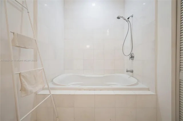 a close view of a bathtub in bathroom