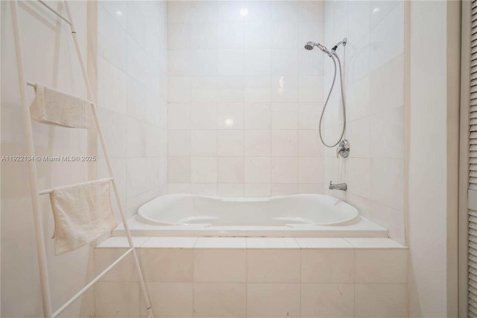 2001 Meridian Avenue, Unit 512 Miami Beach, FL 33139 - Photo 15 of 32 a close view of a bathtub in bathroom