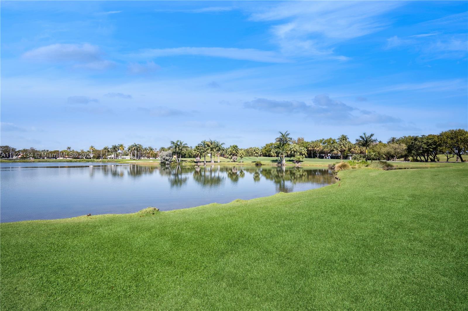 2001 Meridian Avenue, Unit 512 Miami Beach, FL 33139 - Photo 31 of 32 a view of a lake with houses in the back