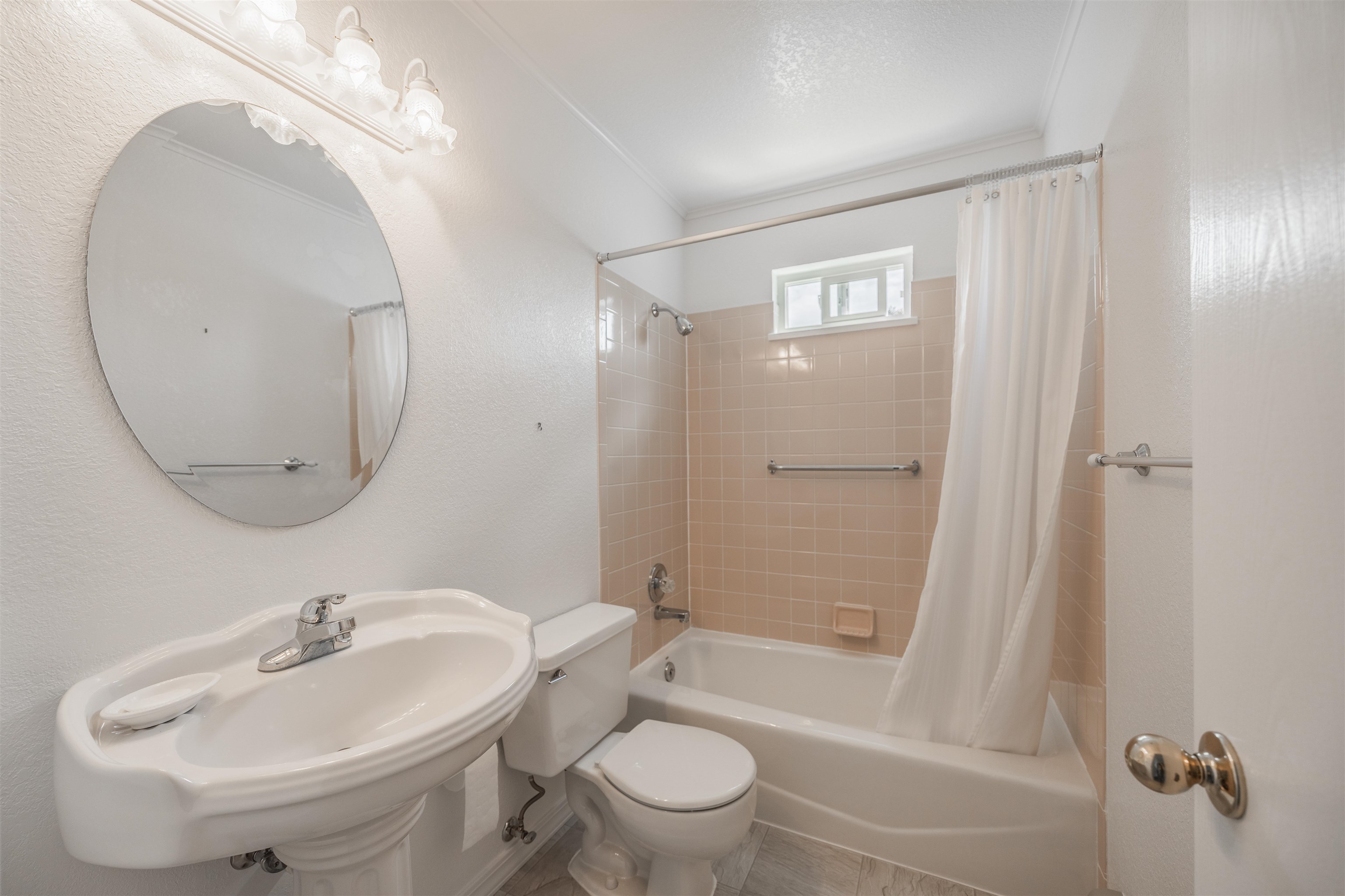 2135 Winston Way, Unit B Montrose, CO 81401 - Photo 11 of 23 a bathroom with a sink toilet and shower