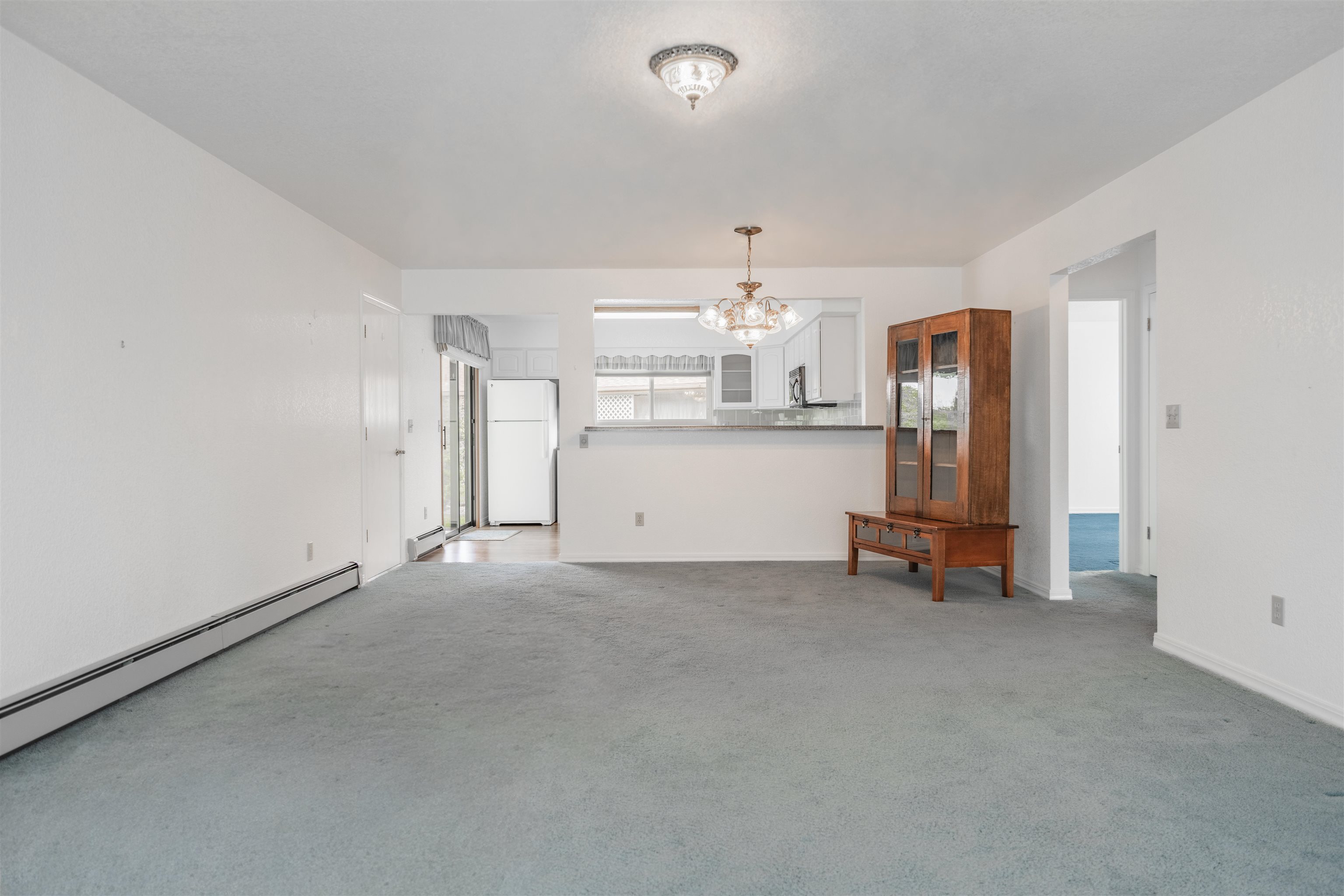 2135 Winston Way, Unit B Montrose, CO 81401 - Photo 4 of 23 a view of a livingroom with furniture and a window