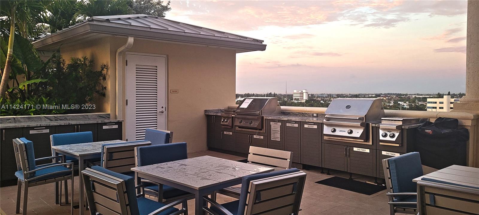 2650 Lake Shore Drive, Unit 2202 Riviera Beach, FL 33404 - Photo 8 of 29 a terrace of a house with outdoor seating