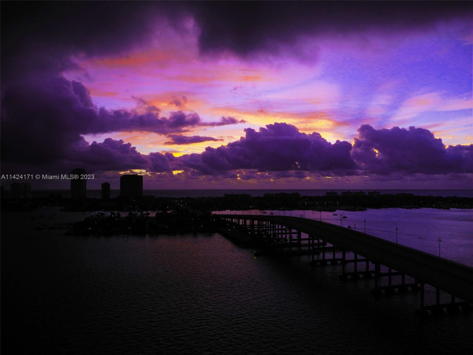 2650 Lake Shore Drive, Unit 2202 Riviera Beach, FL 33404 - Photo 9 of 29 a view of sunset