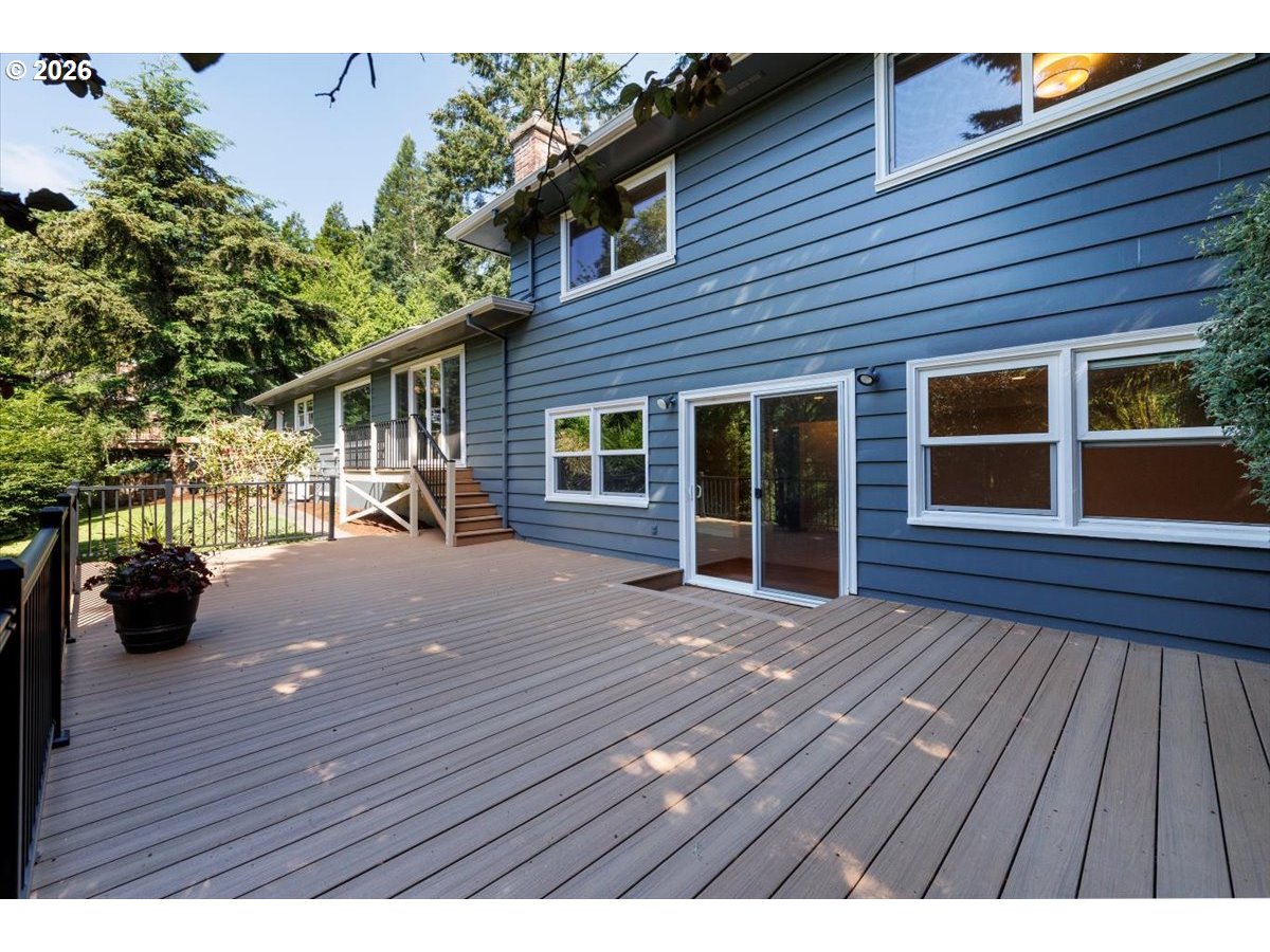 175 Northwest 95th Avenue Portland, OR 97229 - Photo 34 of 46 a view of backyard with deck and wooden floor