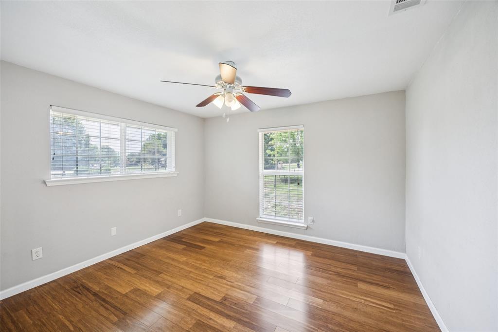 1 Glen Cove Circle Lucas, TX 75002 - Photo 19 of 37 a view of an empty room with wooden floor and a window