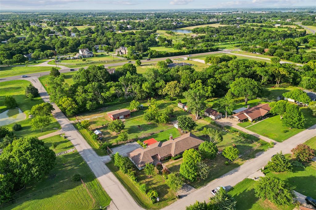 1 Glen Cove Circle Lucas, TX 75002 - Photo 22 of 37 an aerial view of residential houses with outdoor space and trees