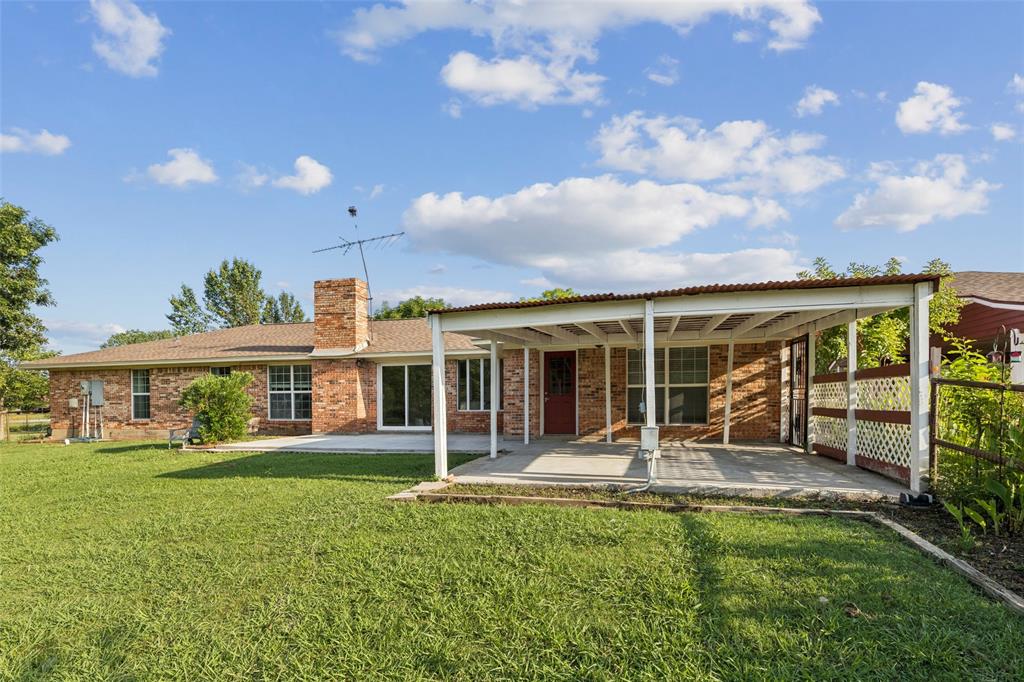 1 Glen Cove Circle Lucas, TX 75002 - Photo 28 of 37 front view of a house with a yard