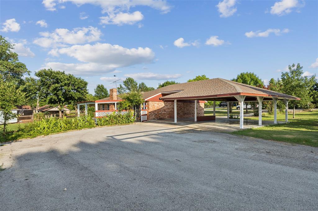 1 Glen Cove Circle Lucas, TX 75002 - Photo 35 of 37 a front view of a house with a yard