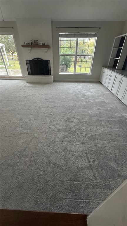 1 Glen Cove Circle Lucas, TX 75002 - Photo 10 of 37 a room with a bed and a fireplace