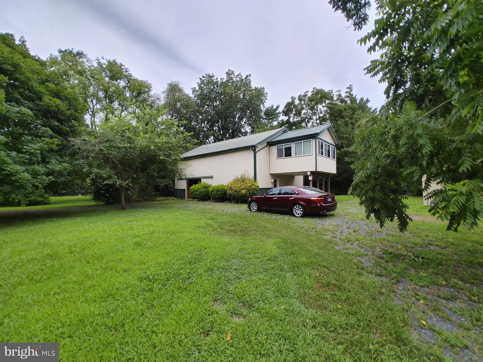 6366 Galestown-Reliance Road Federalsburg, MD 21632 - Photo 1 of 55 a view of a house with a back yard