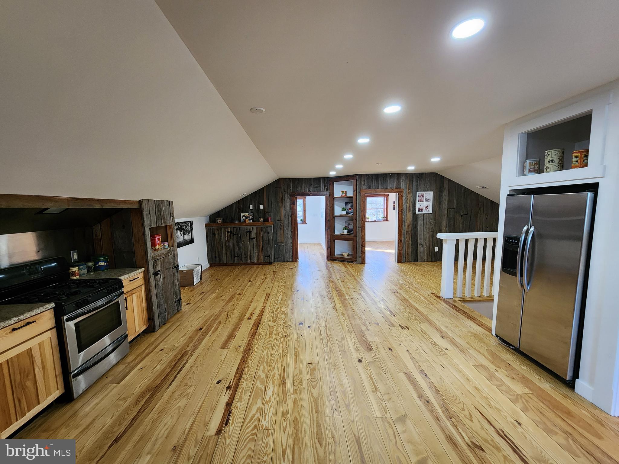 6366 Galestown-Reliance Road Federalsburg, MD 21632 - Photo 36 of 55 a open kitchen with a sink and wooden floor
