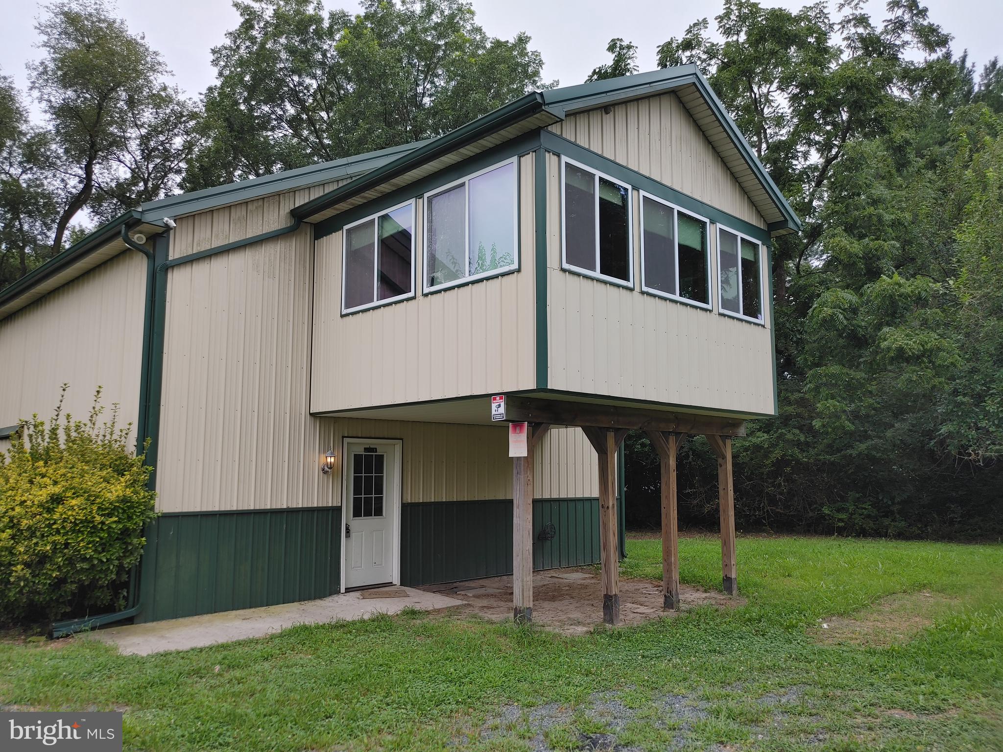 6366 Galestown-Reliance Road Federalsburg, MD 21632 - Photo 52 of 55 a front view of a house with a yard