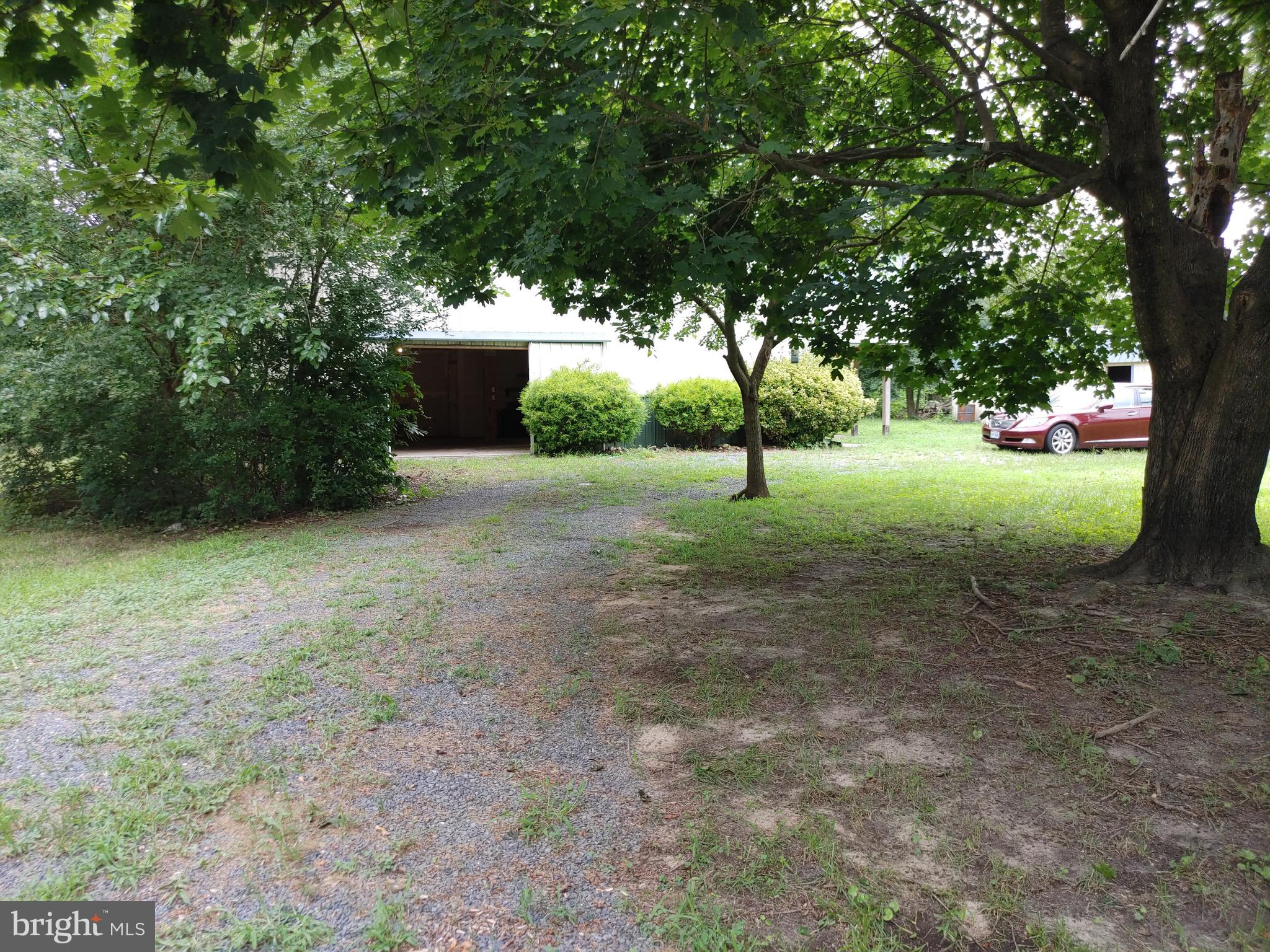 6366 Galestown-Reliance Road Federalsburg, MD 21632 - Photo 53 of 55 a view of outdoor space with deck and tree