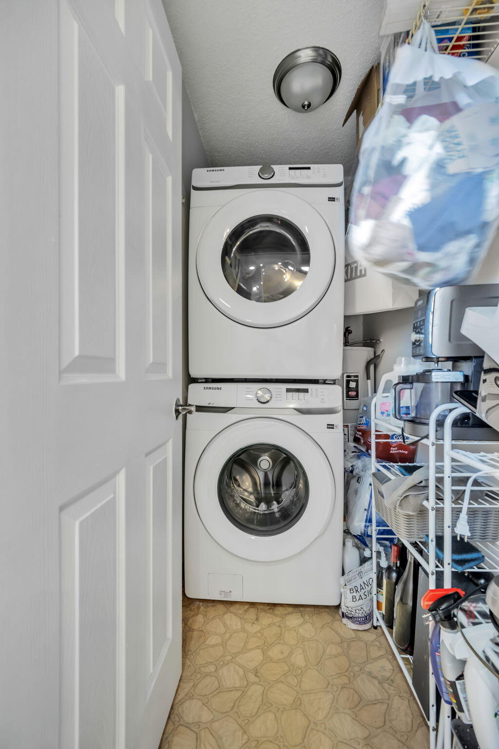 6699 Northwest 2nd Avenue, Unit 416 Boca Raton, FL 33487 - Photo 18 of 28 Laundry-Pantry Closet