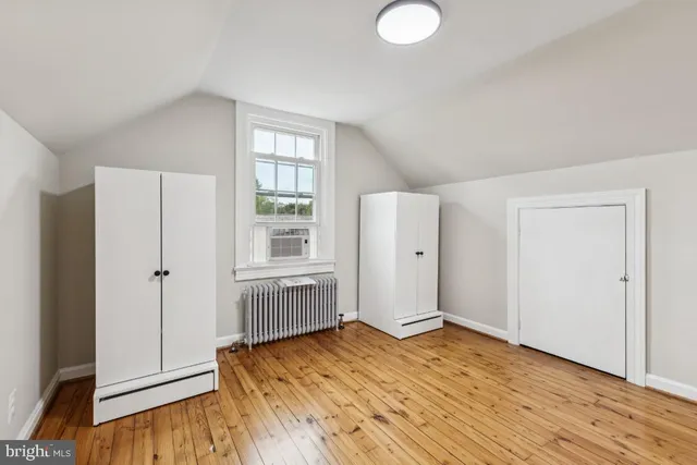 a view of a livingroom with wooden floor