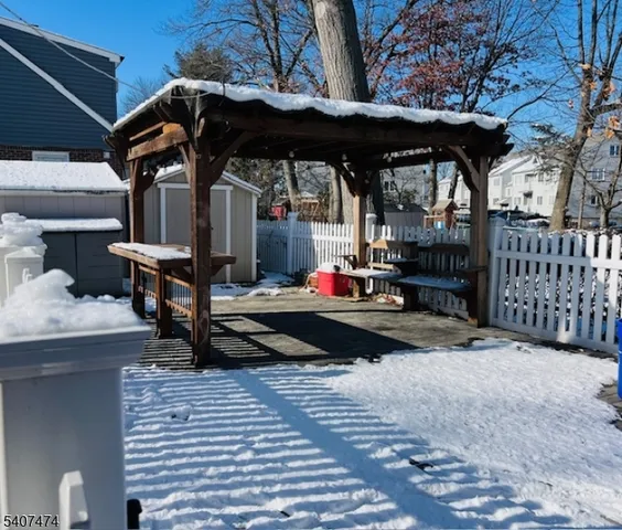 a view of a chair and table in the patio
