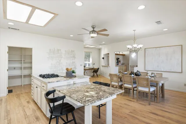 a bathroom with a sink double vanity and a mirror